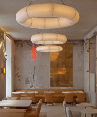 Reforma integral del local del restaurante Aüakt en Madrid por Mil Studios.